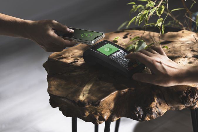 Contactless Payment on Wooden Table