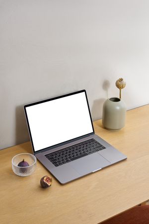 Laptop computer in a desk table